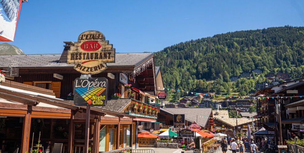 Morzine town centre in summer with restaurants, cafes