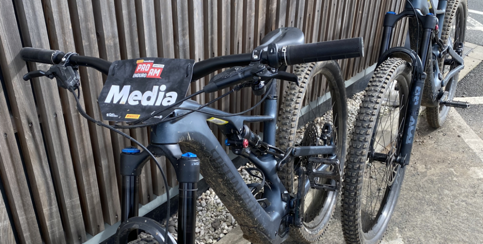 Specialized Levo SL Mountain Bikes resting on wall