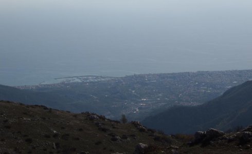 Epic view down to the beach mountain bike adventure Italy