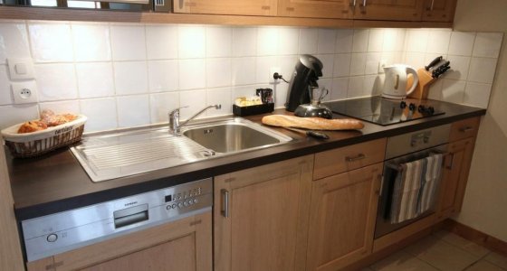 Kitchen at L'Aiglon apartments with MTB Beds