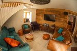 tv lounge area in chalet five25 morzine