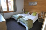 Twin bedroom in Morzine L'Aiglon apartment