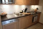 Kitchen at L'Aiglon apartments with MTB Beds