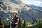 girls riding bike in morzine